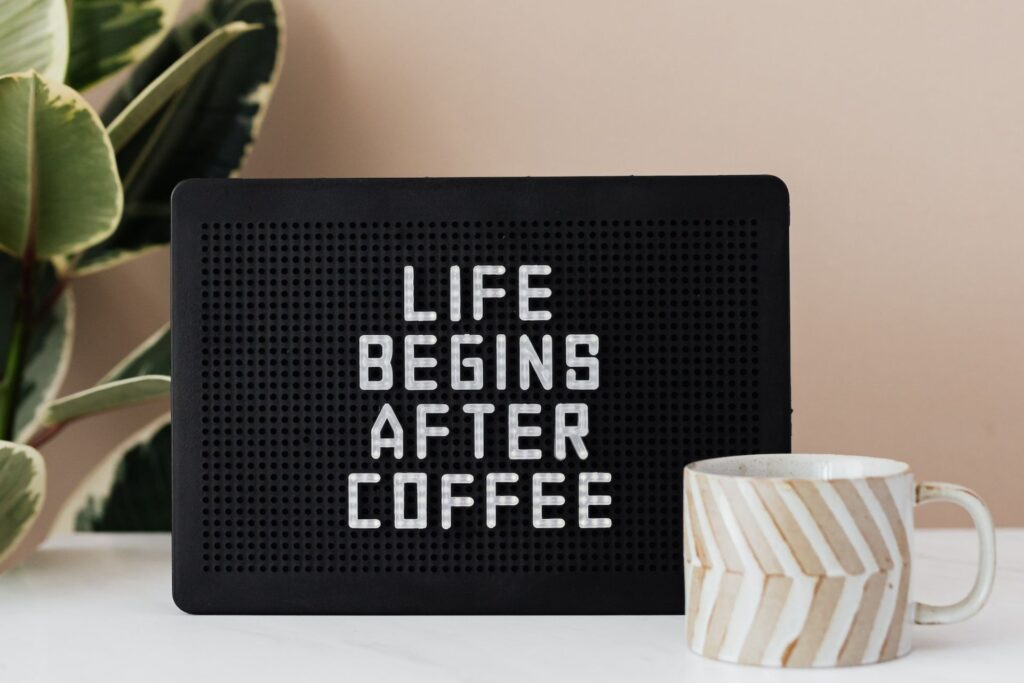 Coffee cup with a title life begins after coffee